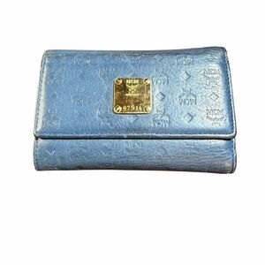 Authentic MCM Blue Embossed Monogram Leather Trifold Wallet